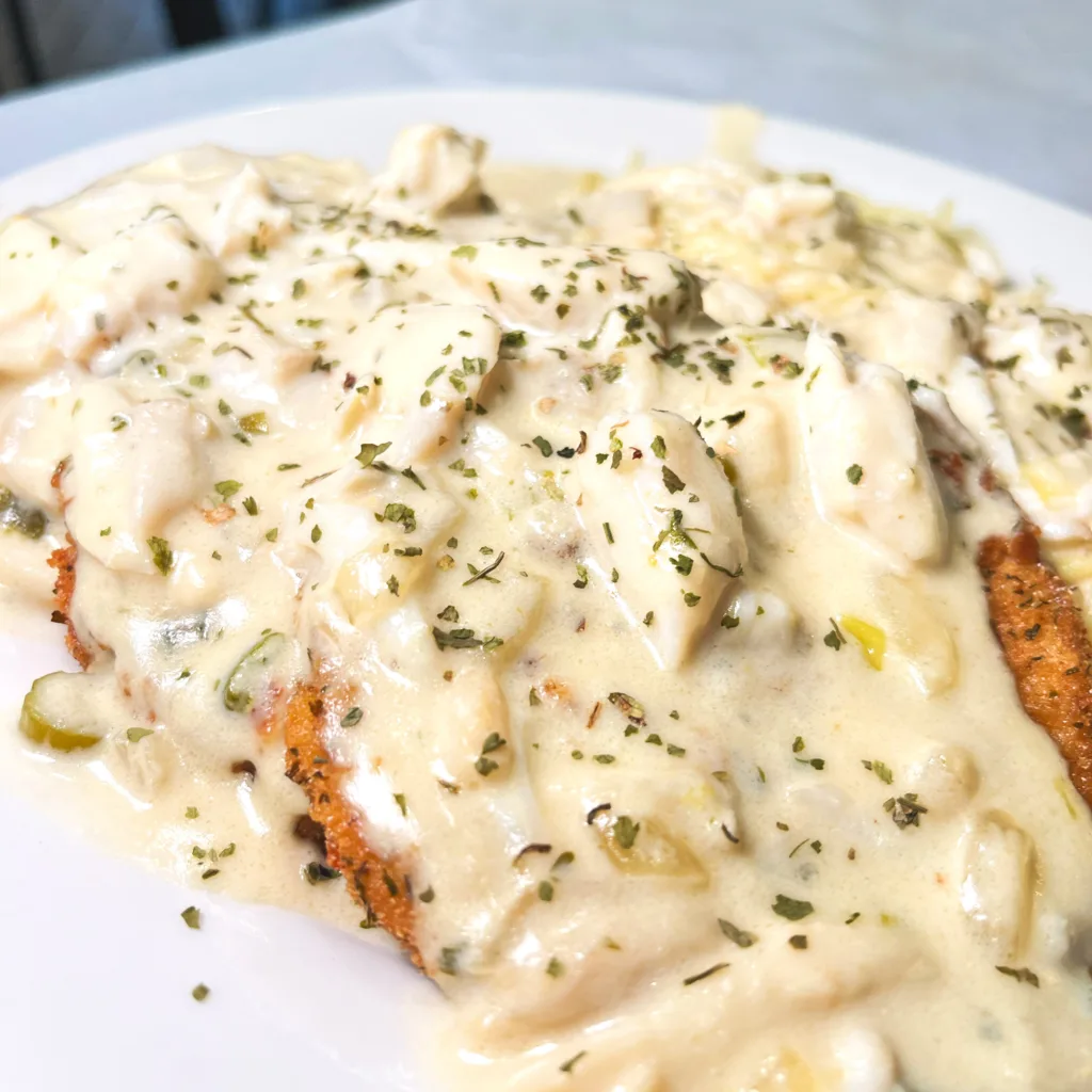 Fury’s famous Eggplant Mee Mee in Metairie – seafood-topped eggplant in a decadent Louisiana-style cream sauce